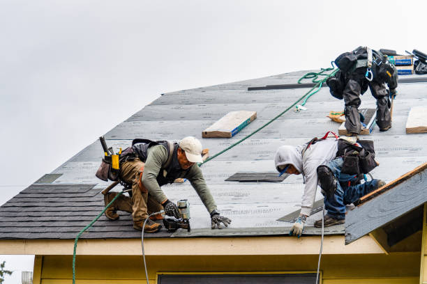 Professional Storm Damage Roof Repair technician working in Saugatuck, CT